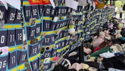 九江一教资考点多名考生存放的物品被暴雨淋湿损坏，学校称将核实情况进行赔付